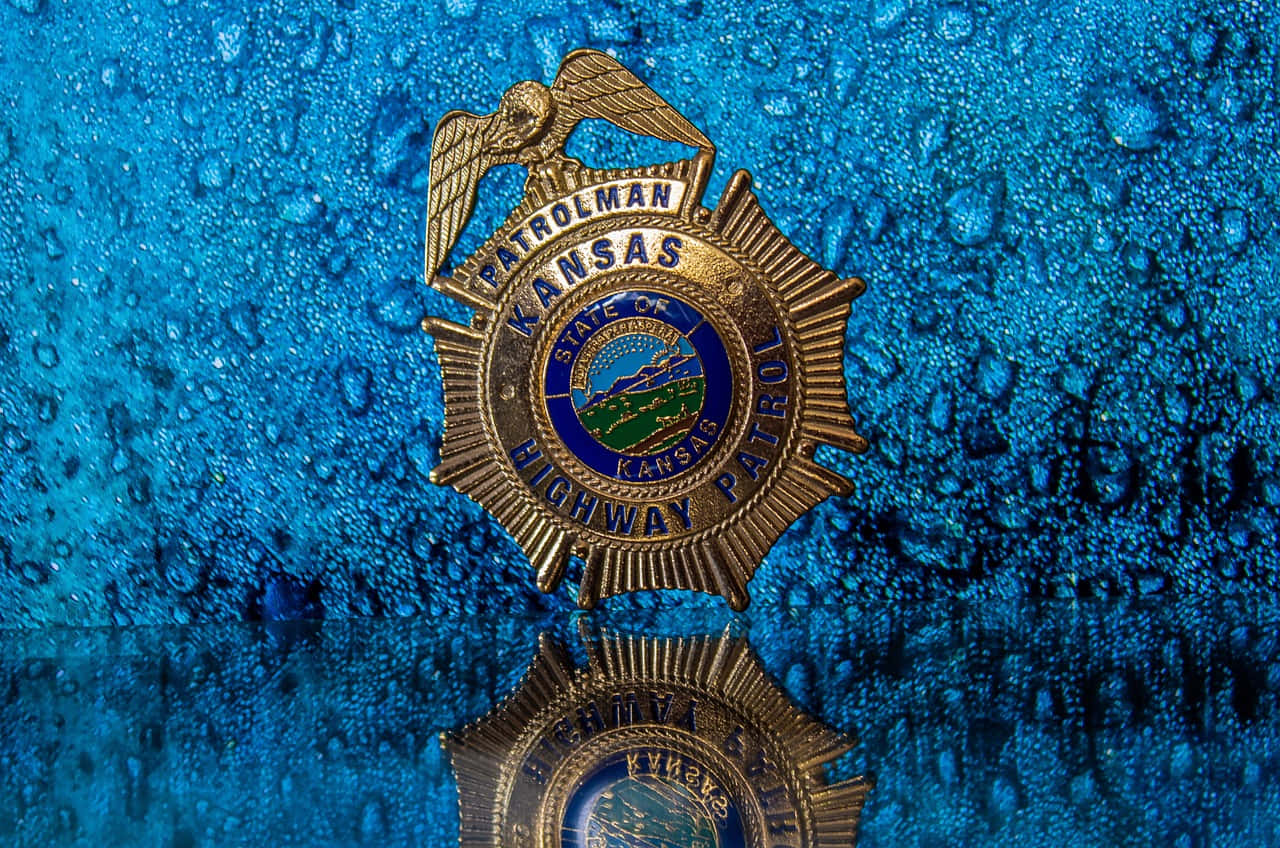 Kansas Highway Patrol Badge Wet Background Wallpaper