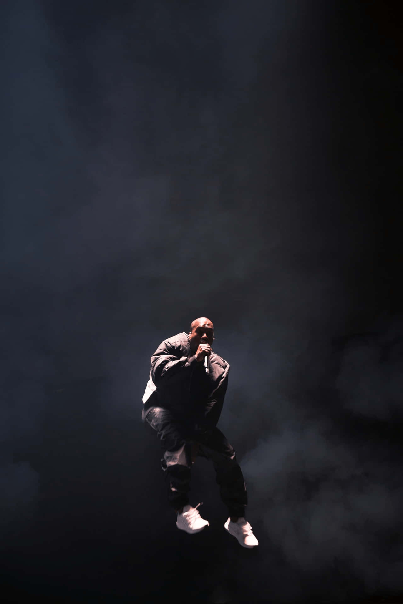 Kanye West unveils his sleek new line of iPhones. Wallpaper