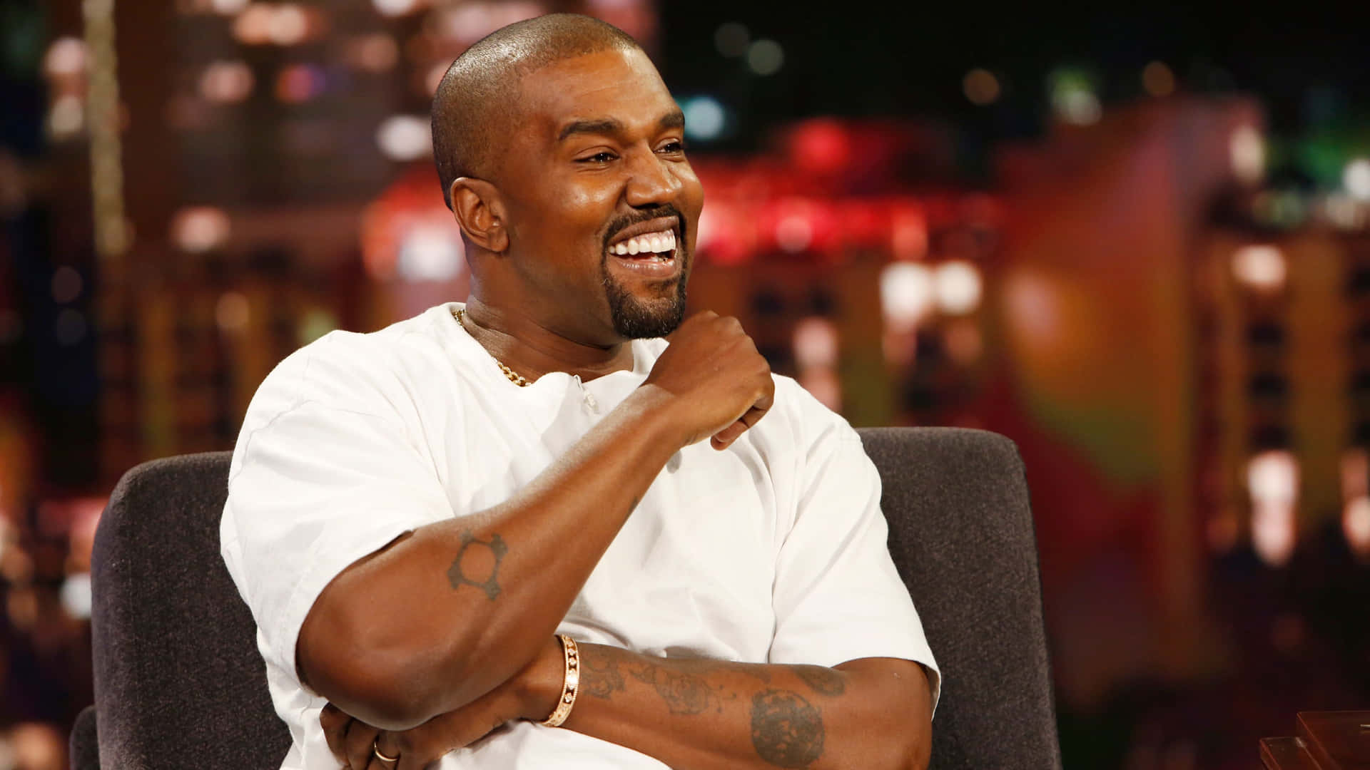 Kanye West Laughing During Interview Wallpaper