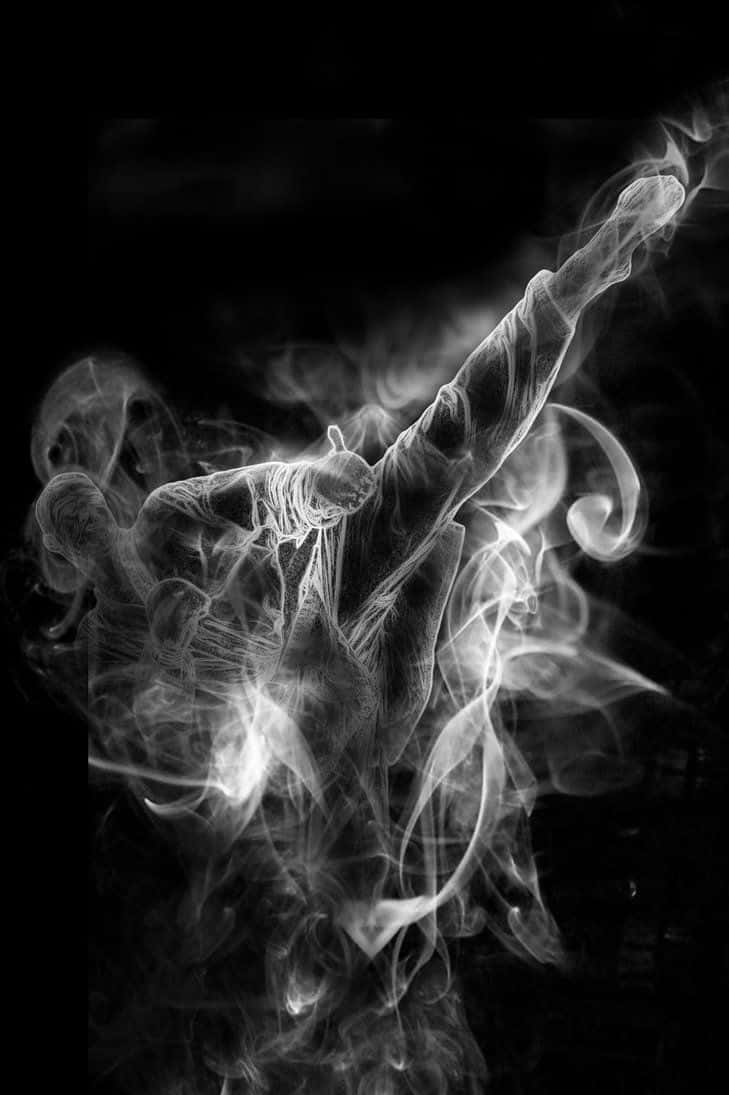 A Black And White Photo Of Smoke