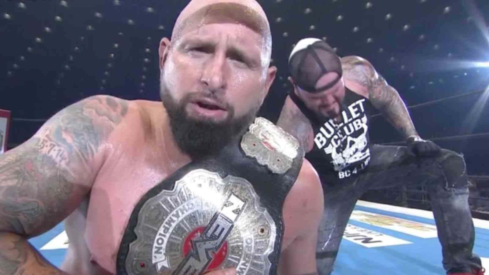 Karl Anderson With His Championship Belt Wallpaper