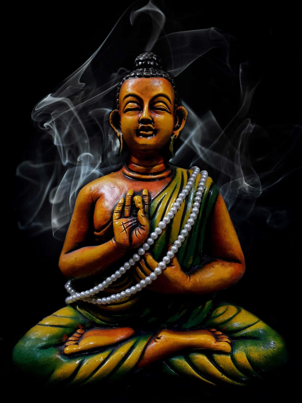 Buddha Statue With Smoke Coming Out Of His Mouth