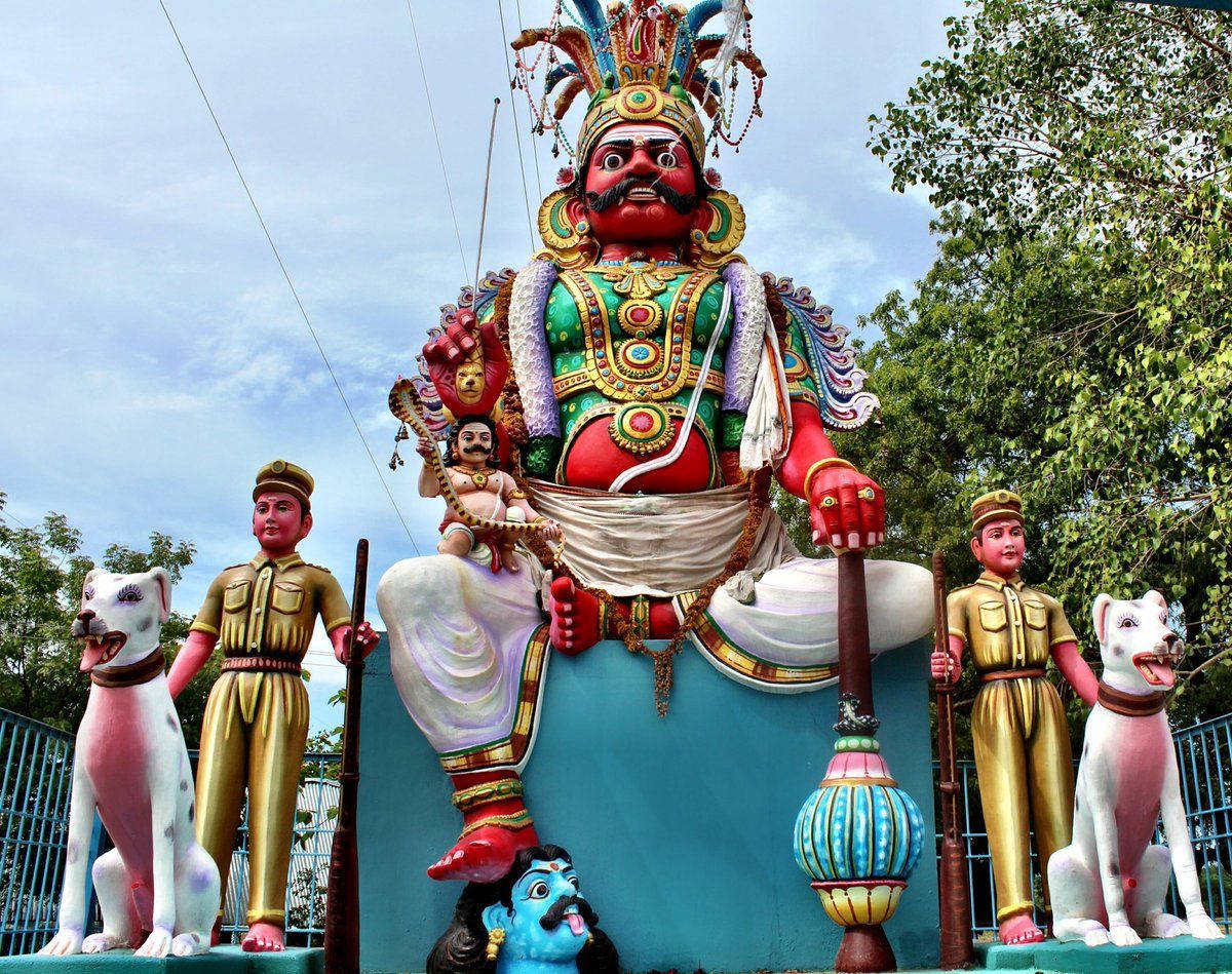 Karuppasamy Statue With Servant Statues Wallpaper