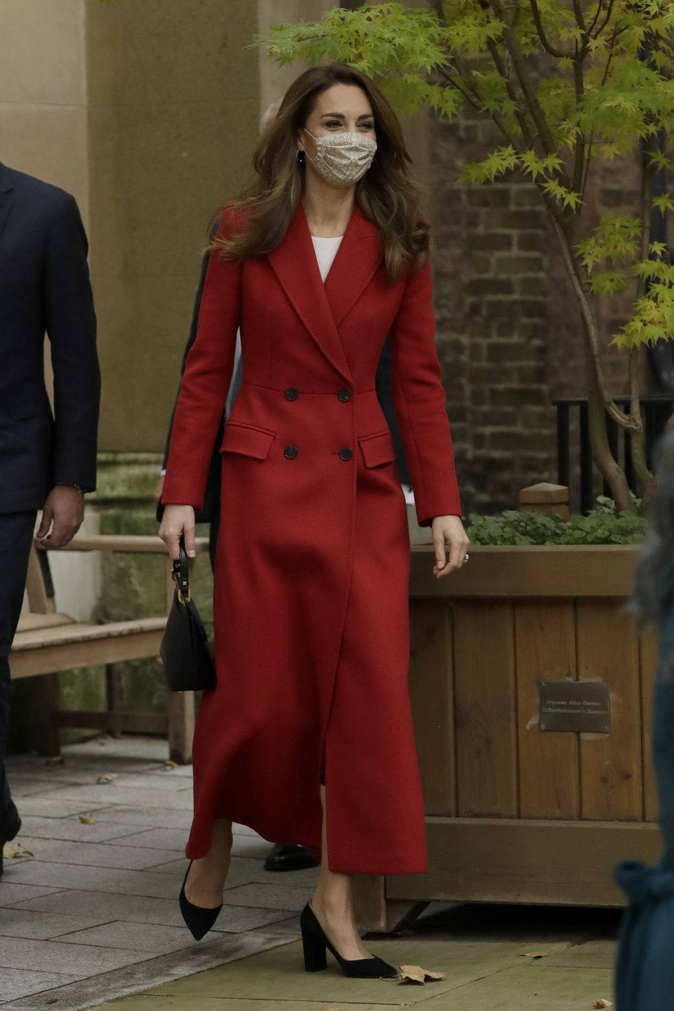 Kate Middleton In Red Overcoat Wallpaper