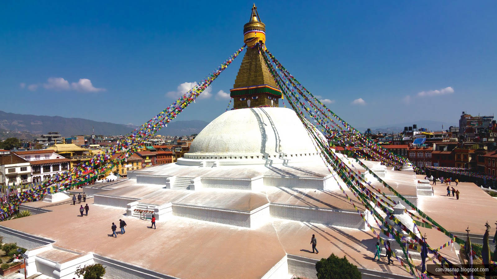 Caption: Majestic view of the White Stupa in Kathmandu Wallpaper