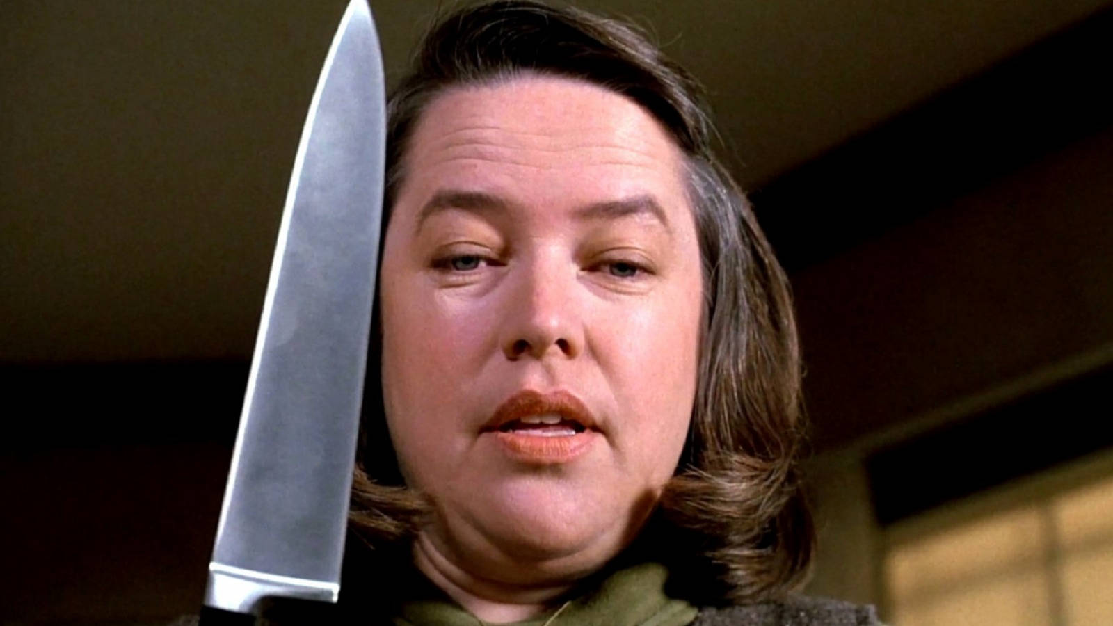 Acclaimed Actress Kathy Bates in a Mysterious Scene Wallpaper