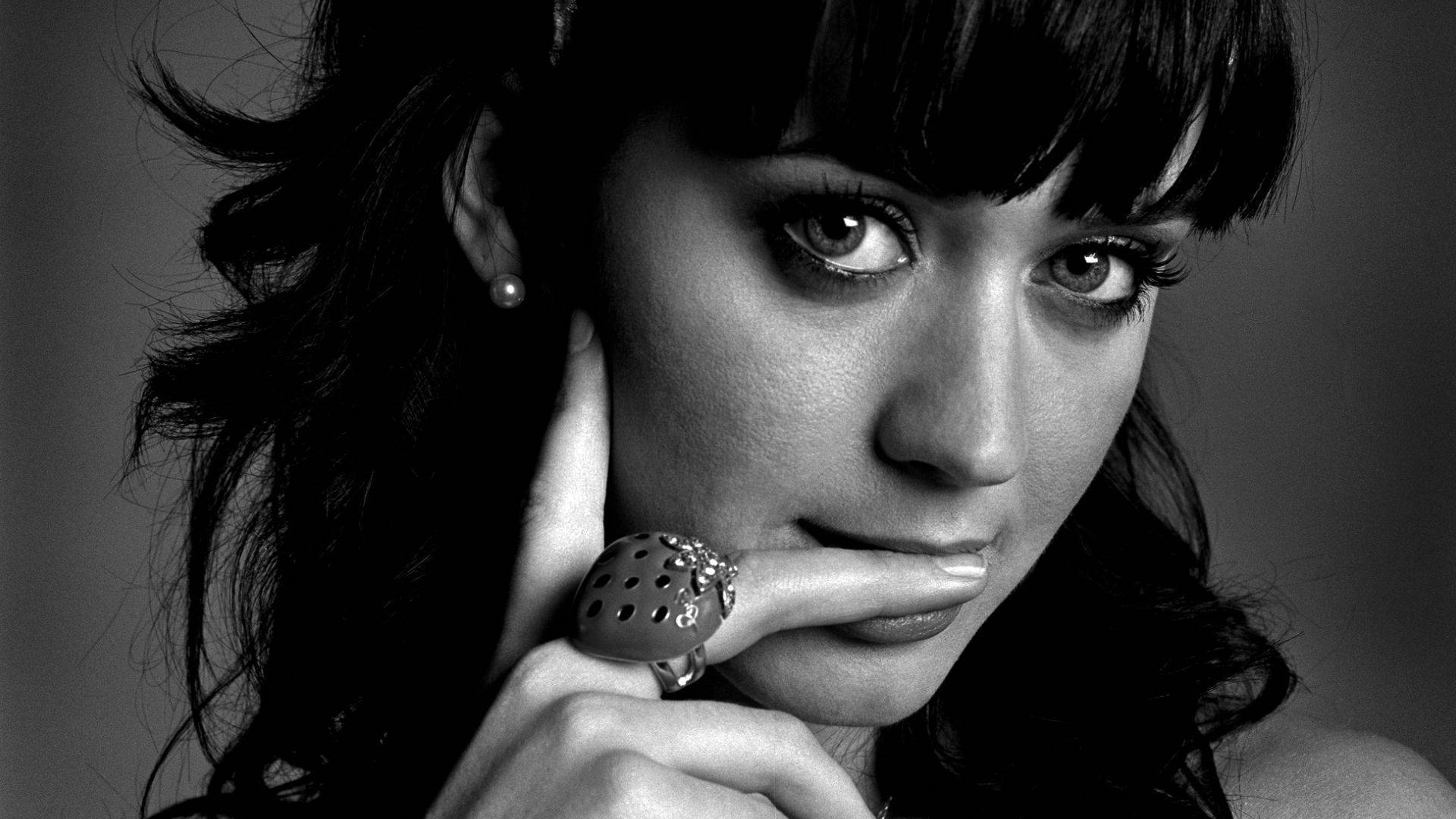 An iconic black and white portrait of singer-songwriter Katy Perry Wallpaper