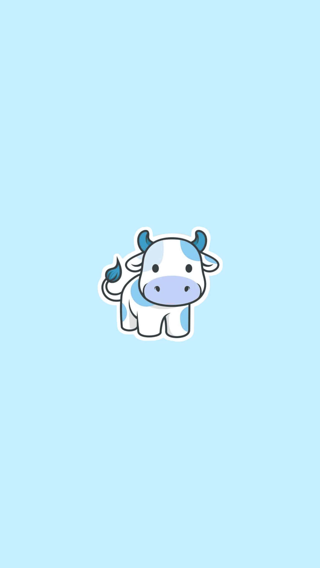 A happy cow enjoying a day out in the sunshine Wallpaper