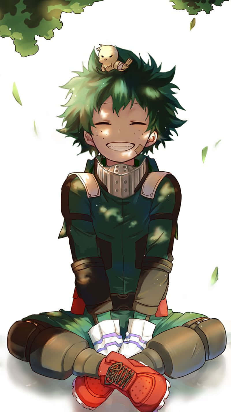 A Boy With Green Hair Sitting On The Ground Wallpaper