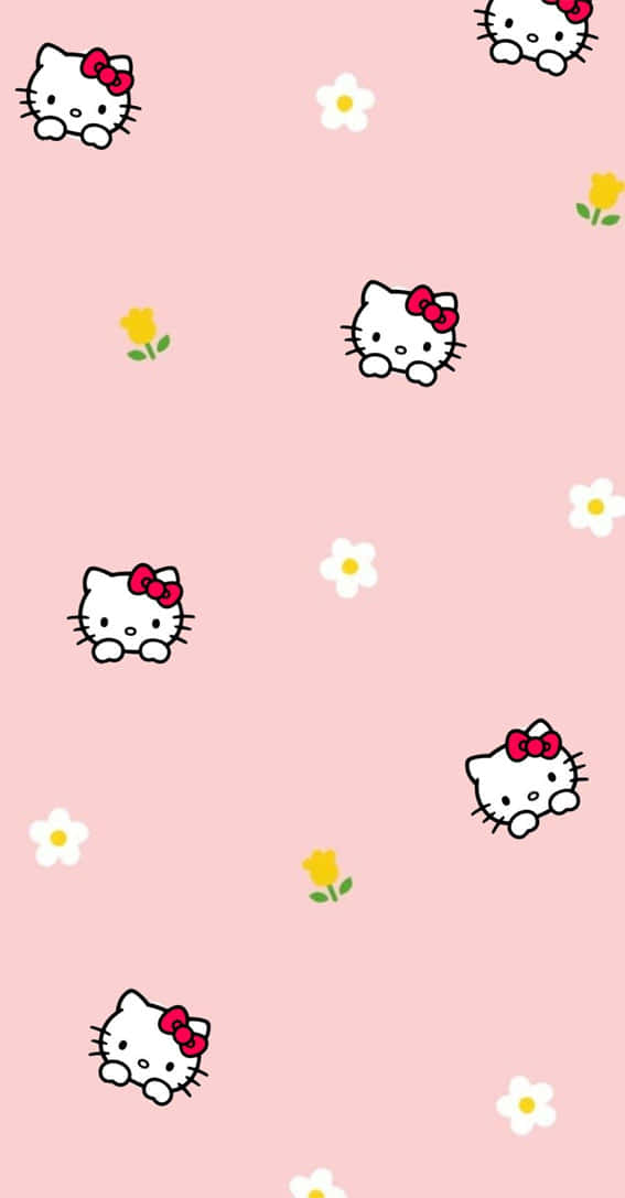 Adorable Kawaii Hello Kitty wallpaper posing with a balloon Wallpaper