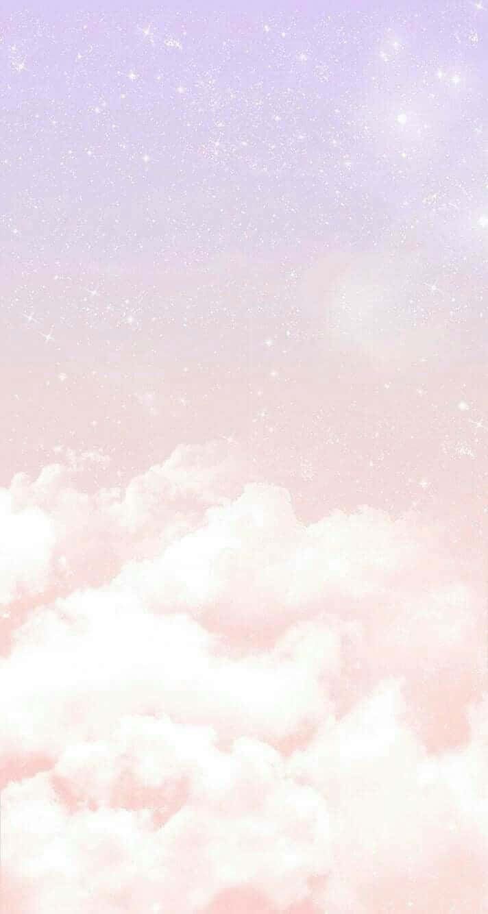 En pink og lilla himmel med skyer og stjerner Wallpaper