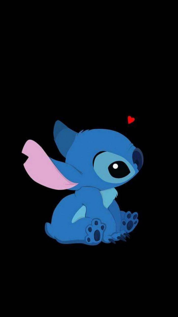 Kawaii Stitch With Tiny Heart And Black Backdrop Wallpaper