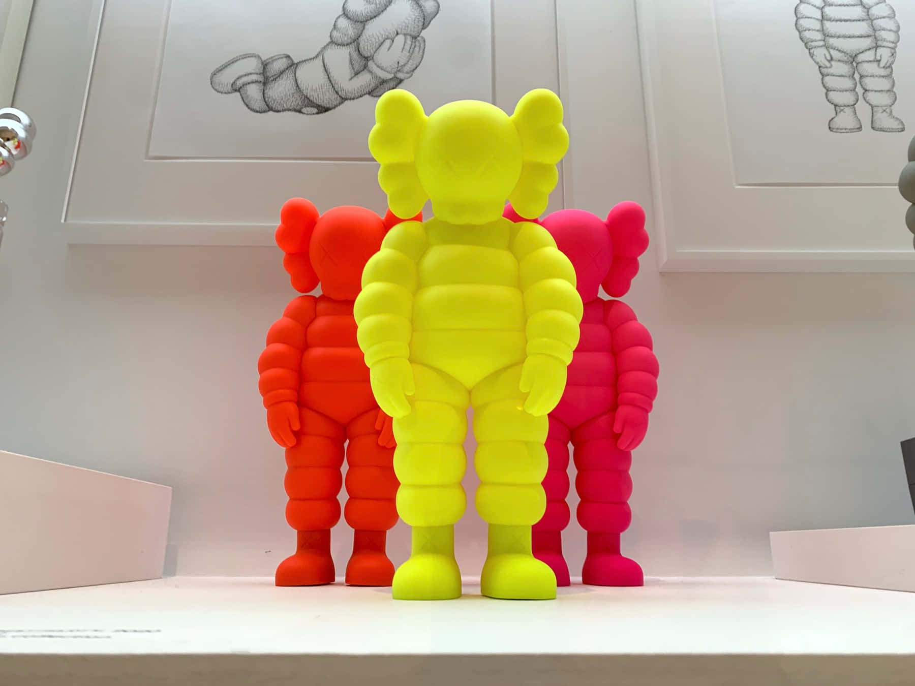 A Colorful Collection of Kaws Figures Wallpaper