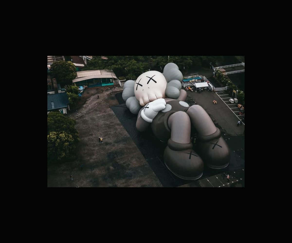 Kaws Holiday - A Journey of Art and Adventure Wallpaper