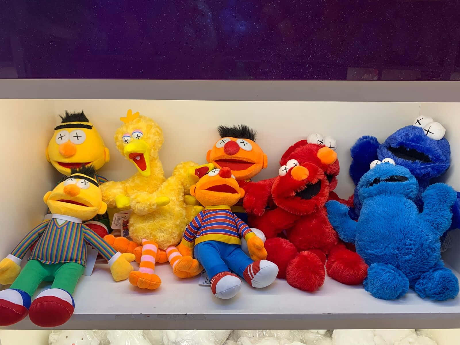 KAWS Collaborates with Sesame Street for Unique Art Piece Wallpaper