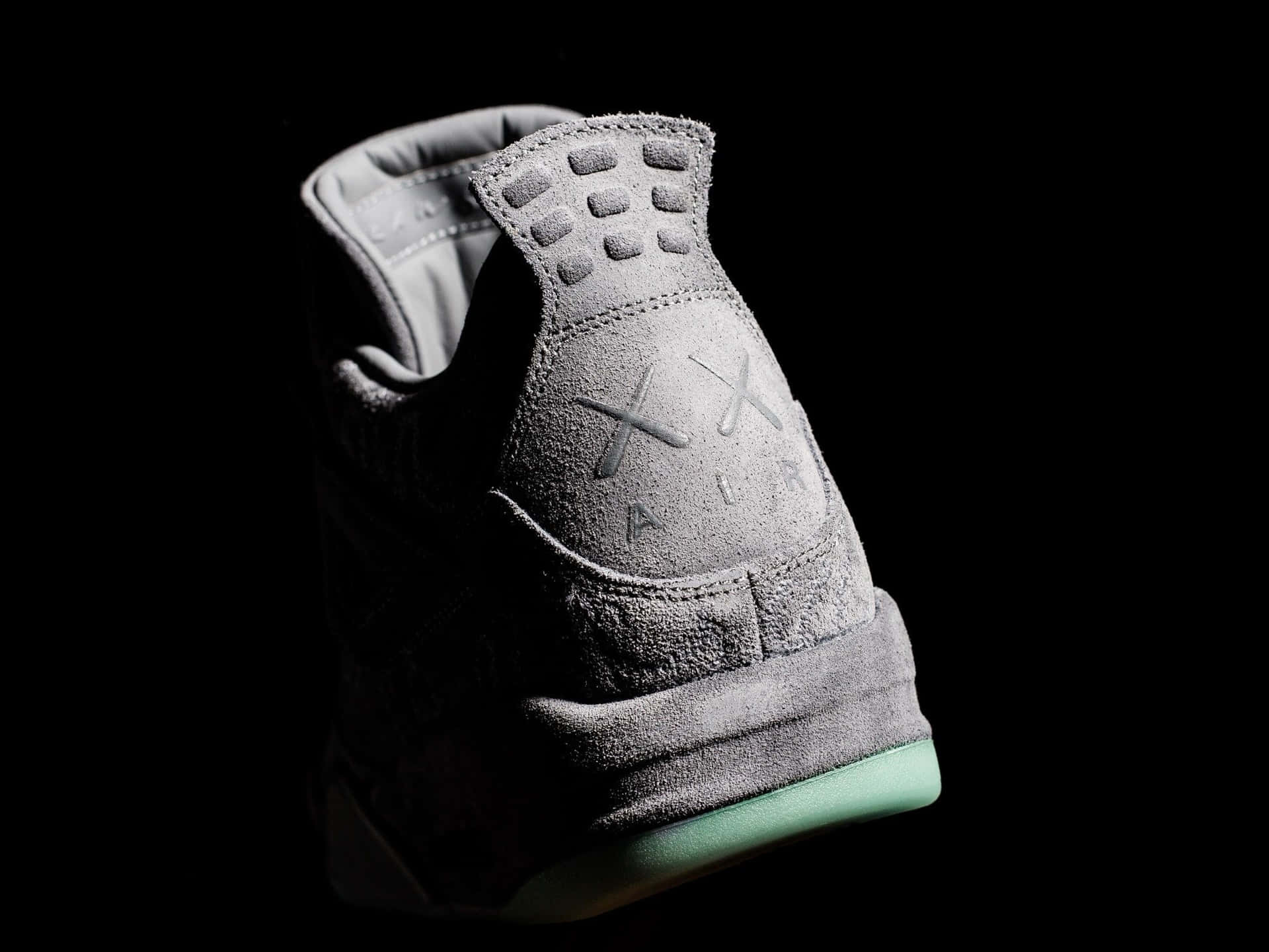 Caption: KAWS x Air Jordan Collaboration Sneaker Design Wallpaper