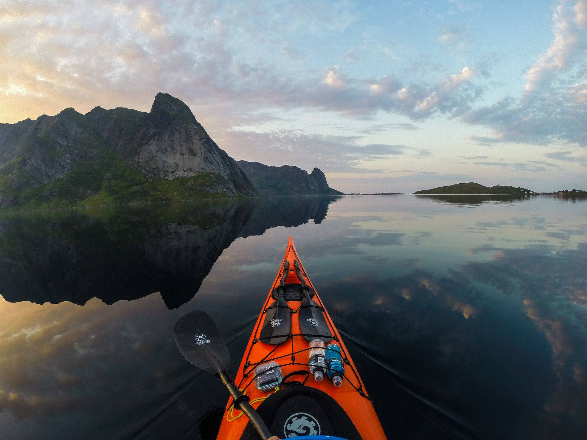 Kayaking Along The Lofoten Archipelago Wallpaper