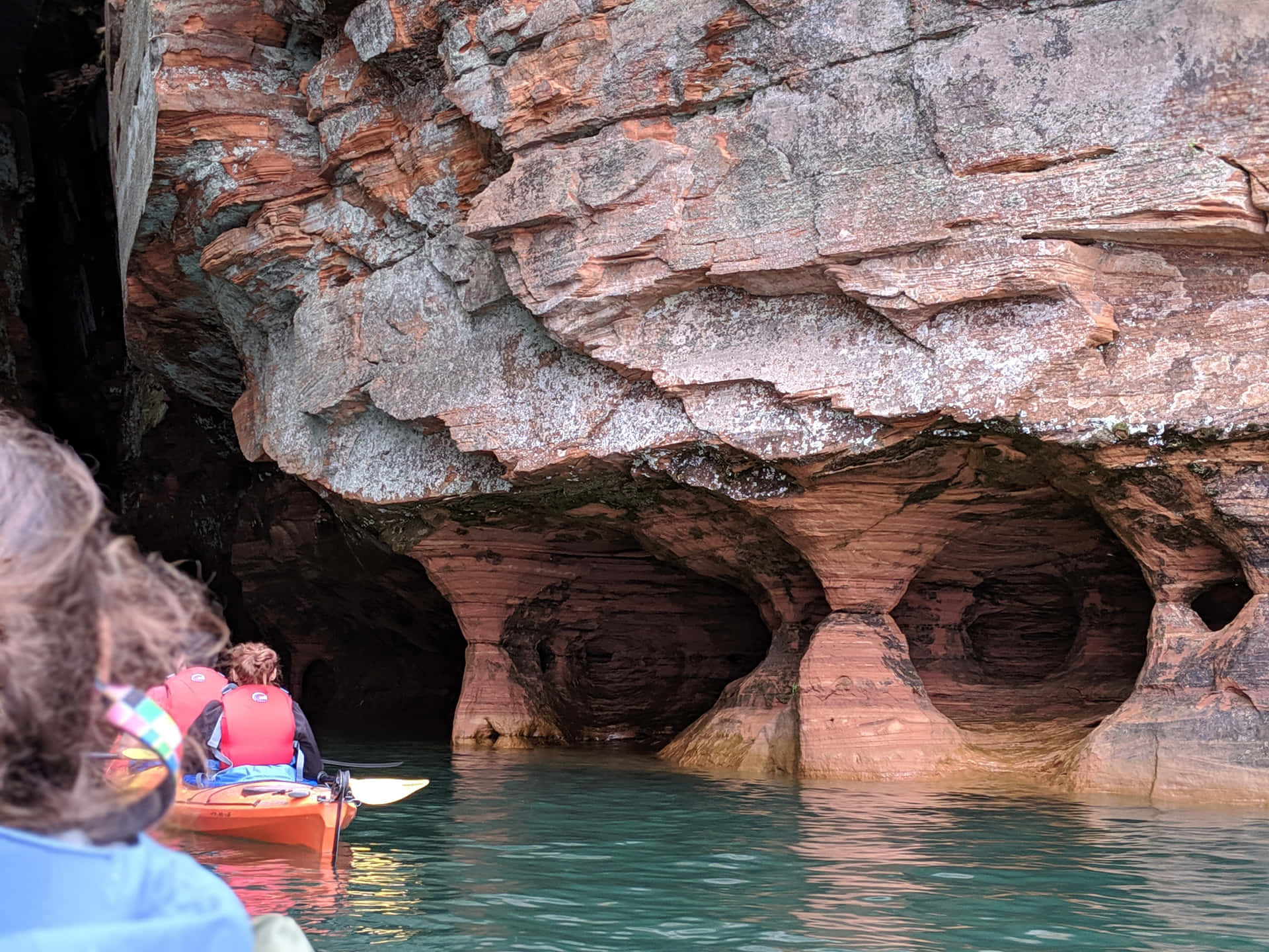 Kayaking Near Sea Caves Wallpaper
