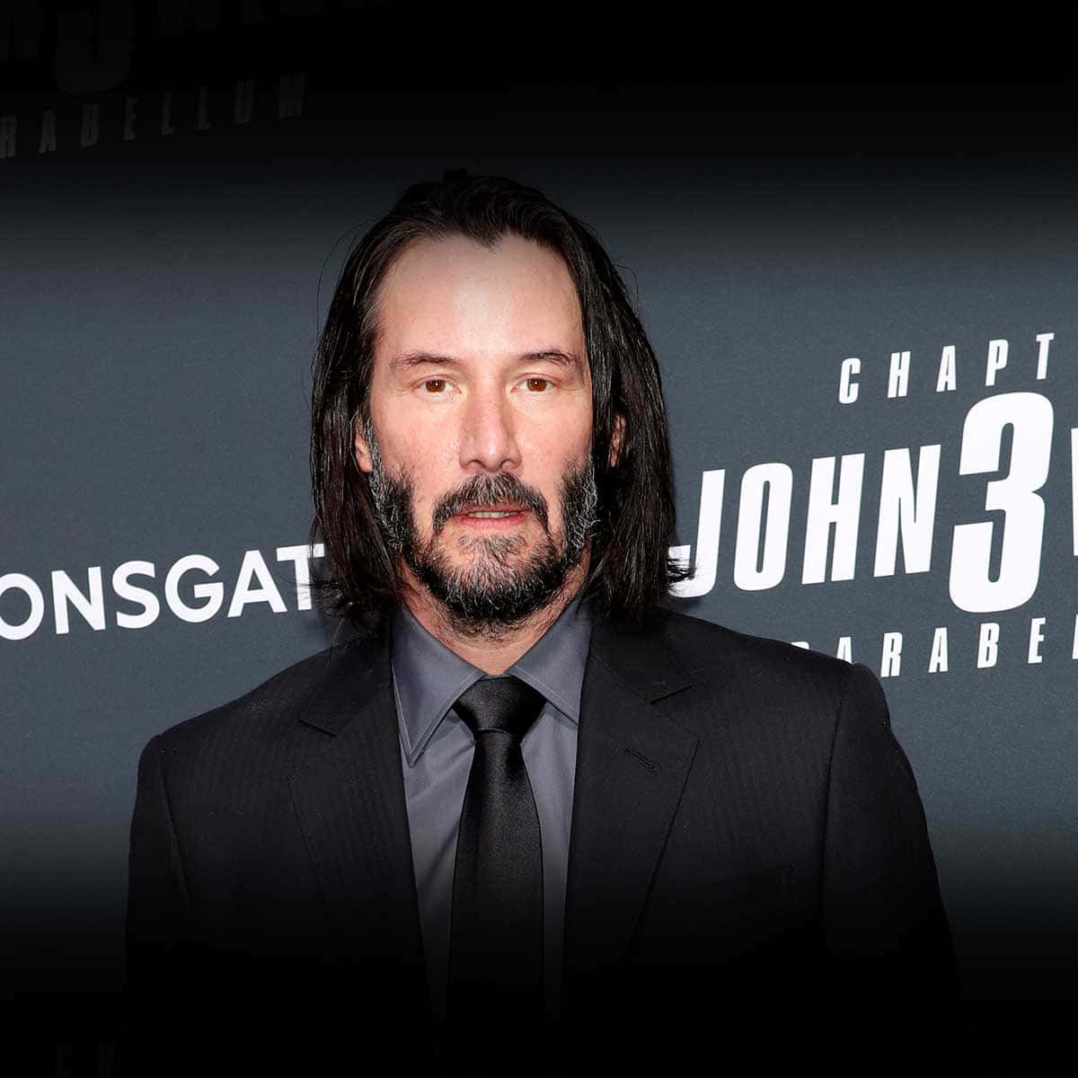 Keanu Reeves Stuns in a Suave Black Suit