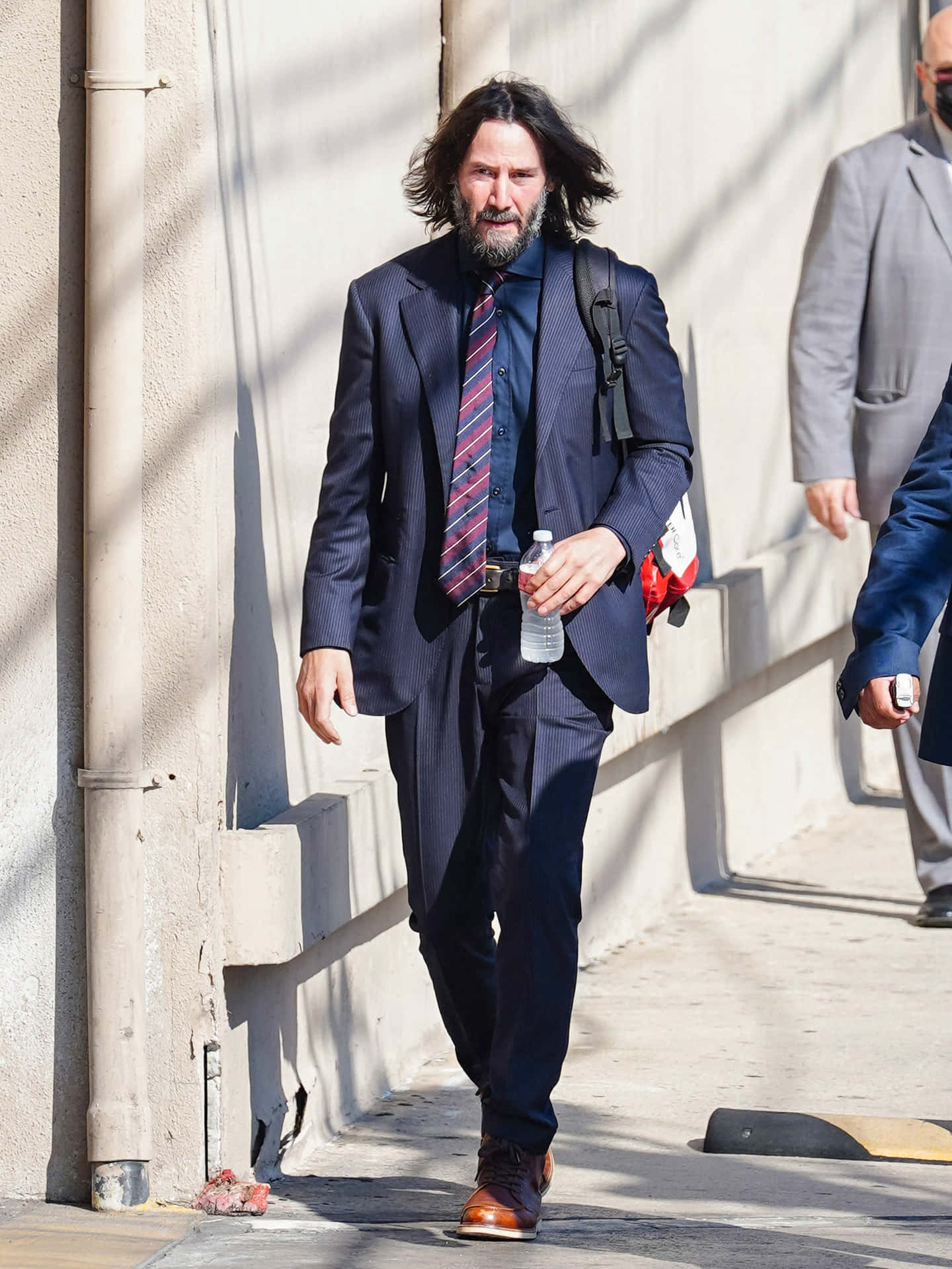 Keanu Reeves Posing in a Stylish Outfit