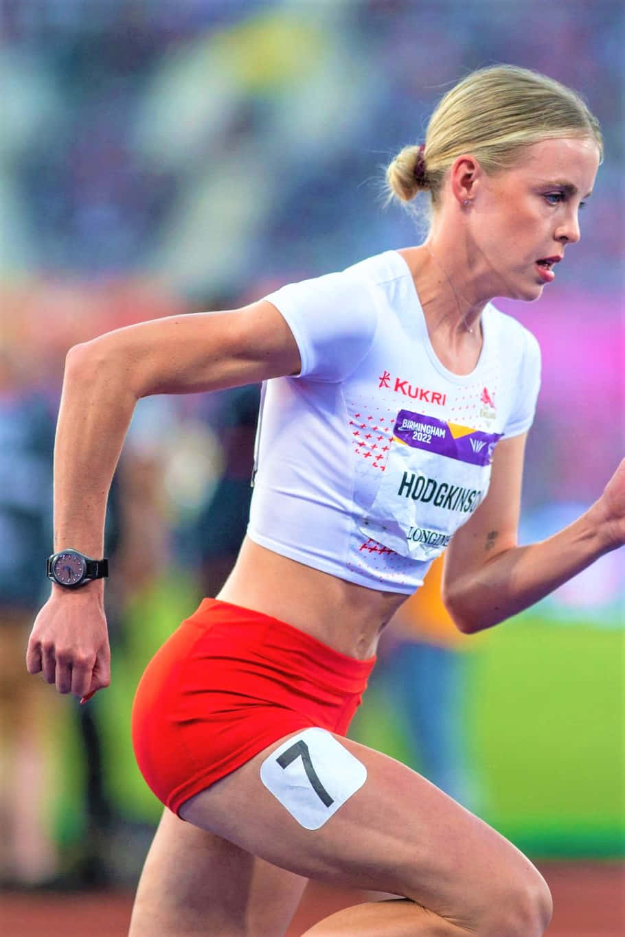 Unaatleta Mujer Corriendo En Una Pista Fondo de pantalla