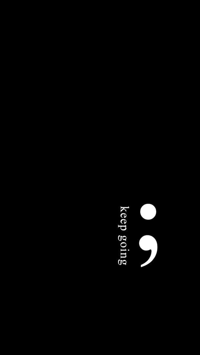 En sort baggrund med et hvidt citat der lyder 'Til lykke' Wallpaper
