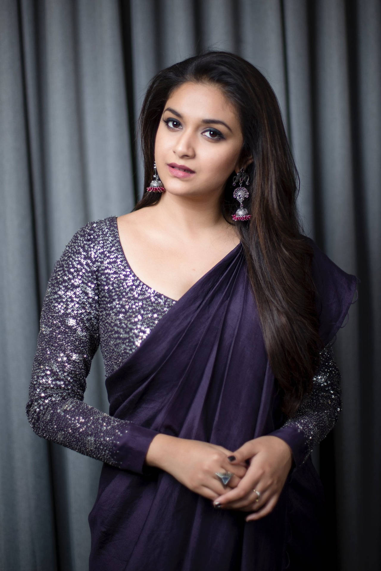Keerthi Suresh Radiating Elegance in Dark Violet Outfit Wallpaper
