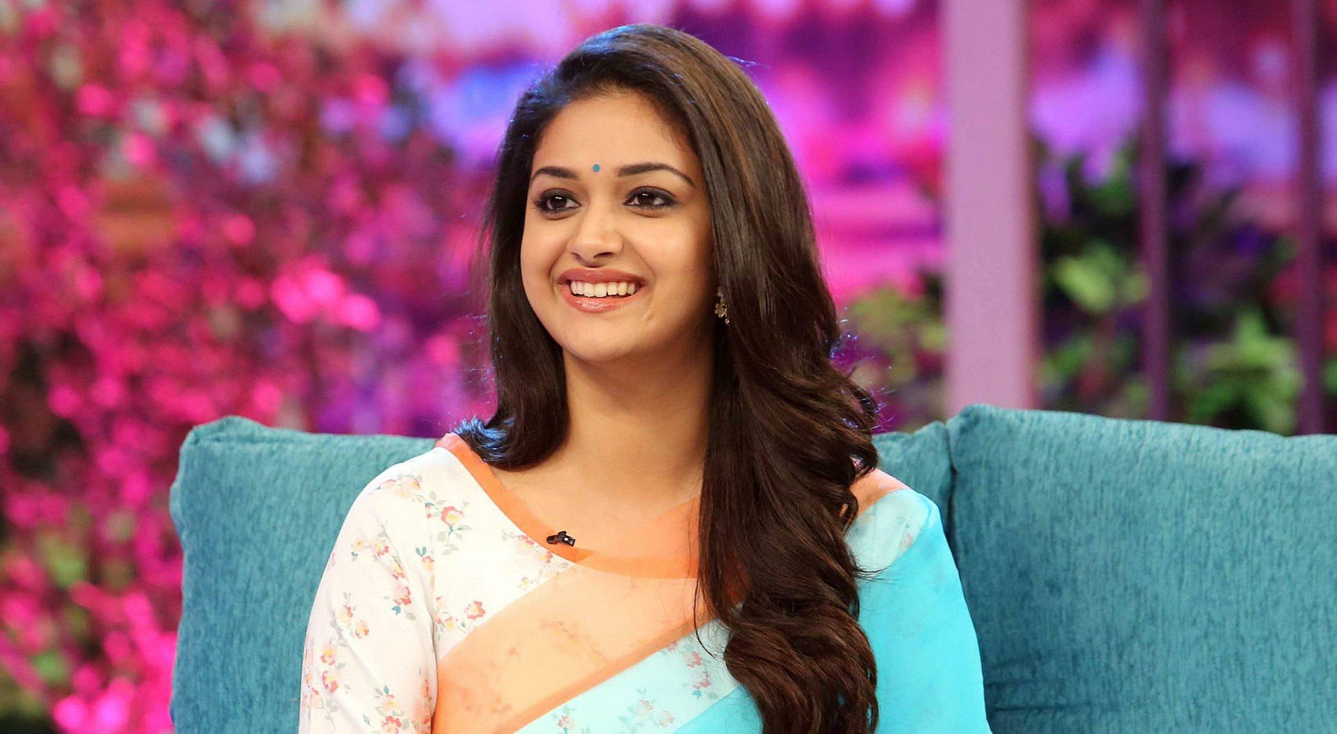 Keerthi Suresh Sitting On Blue Couch HD Wallpaper