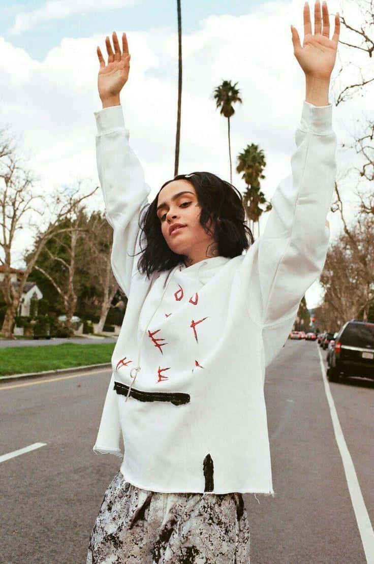 Grammy-nominated Artist Kehlani: Capturing the Artistry and Authenticity in a Candid Shot Wallpaper