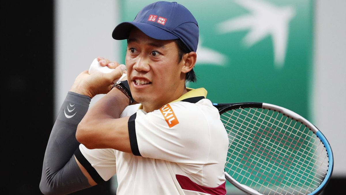 Kei Nishikori Swinging His Wilson Racket Wallpaper