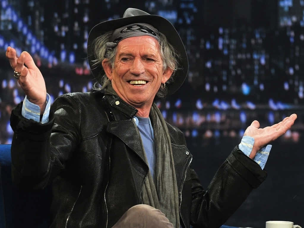 Download Keith Richards Smilingwith Hat Wallpaper | Wallpapers.com