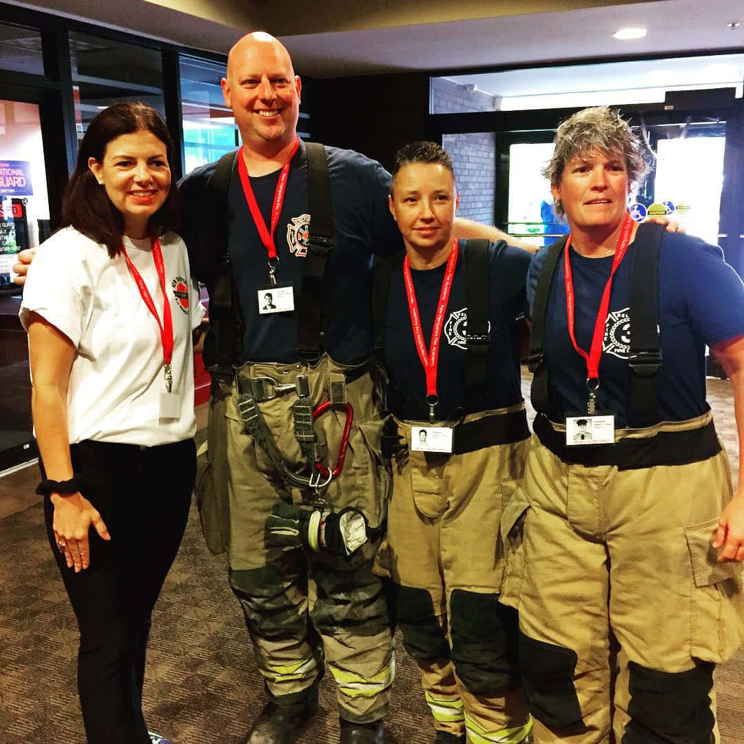 Kelly Ayotte With Firefighters Wallpaper