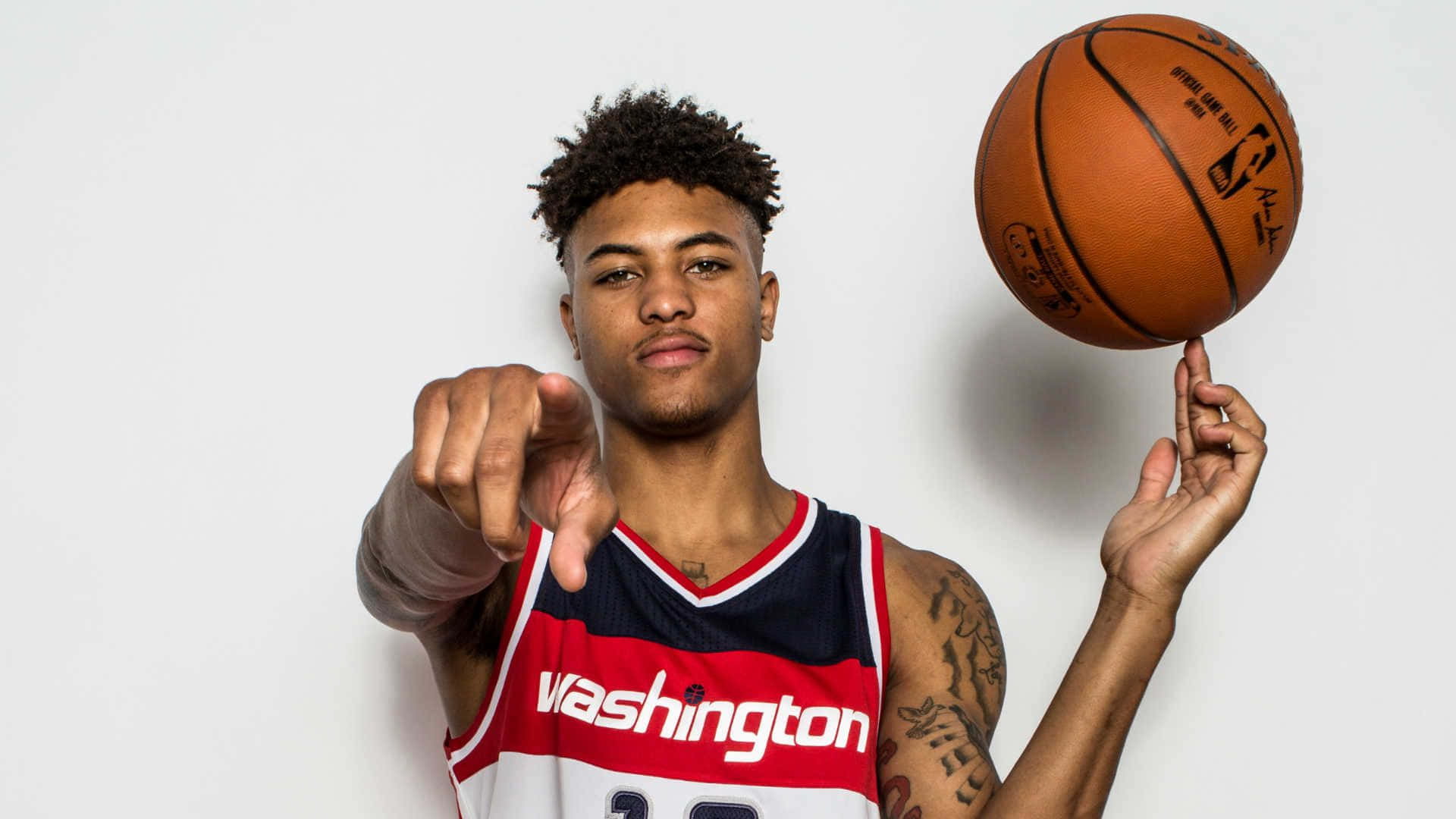 Kelly Oubre Jr. towering over opponents with his long wingspan Wallpaper