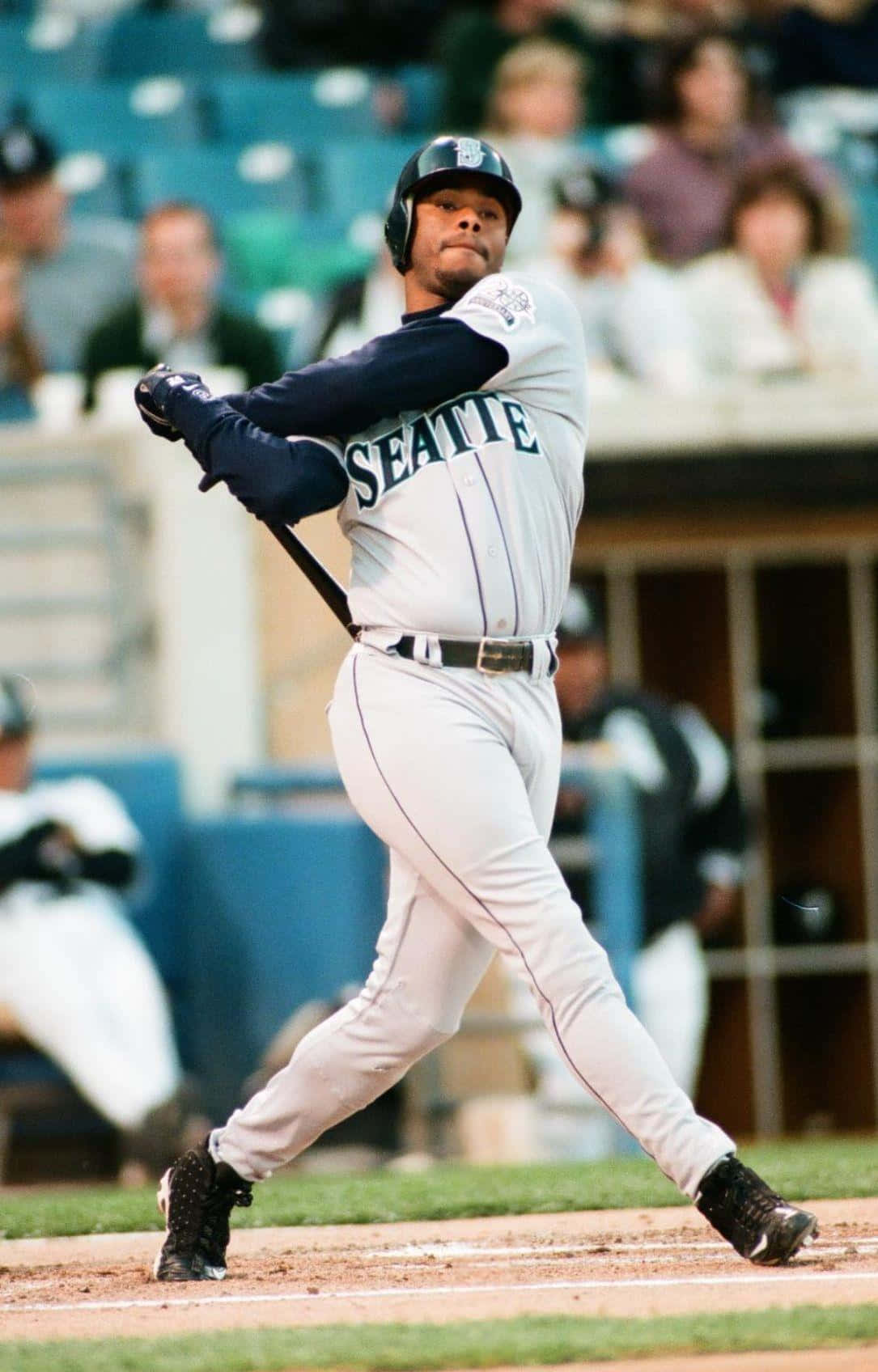 Ken Griffey Swinging His Baseball Bat Background