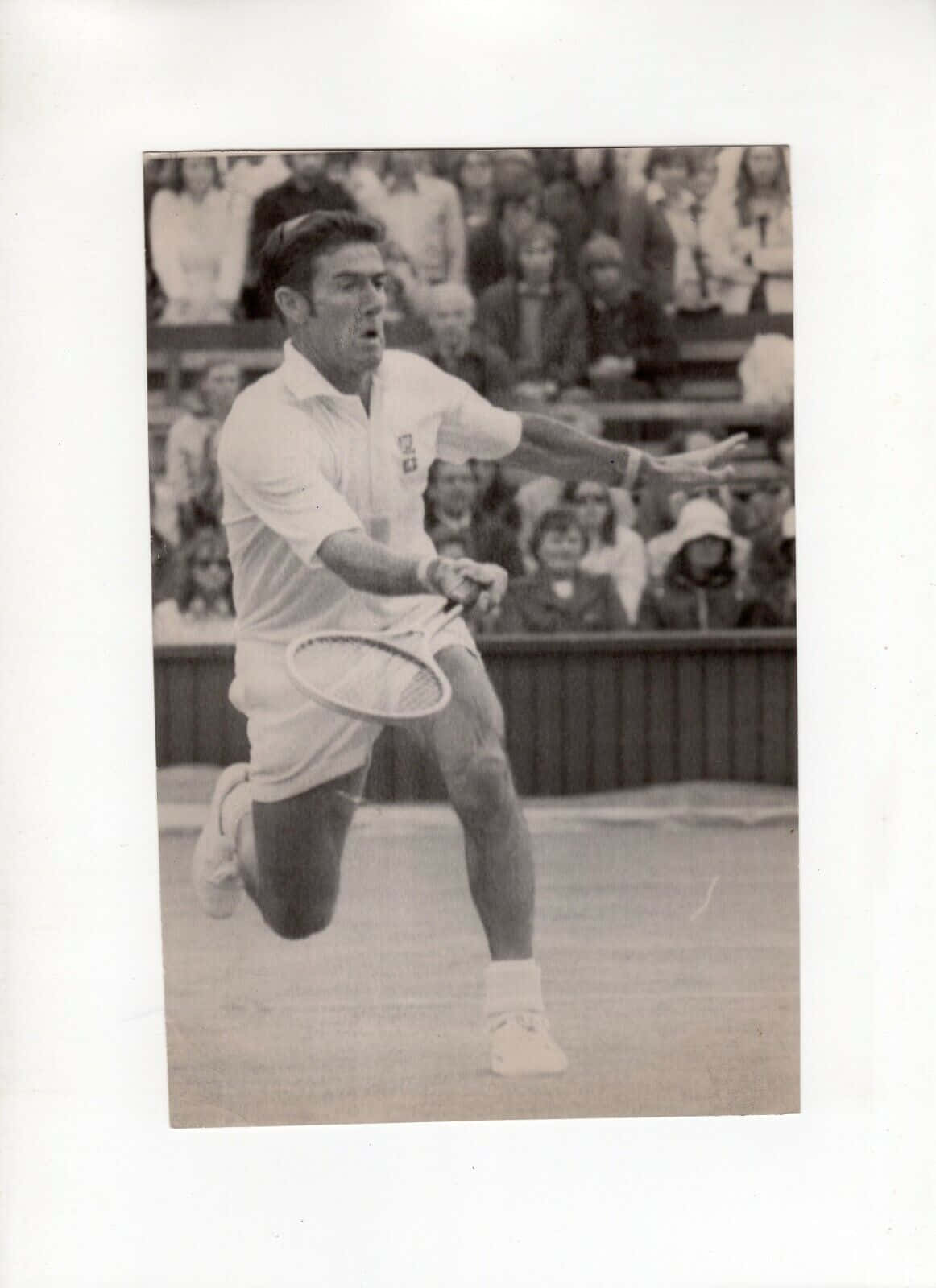 Legendary Tennis Player Ken Rosewall in Action Wallpaper