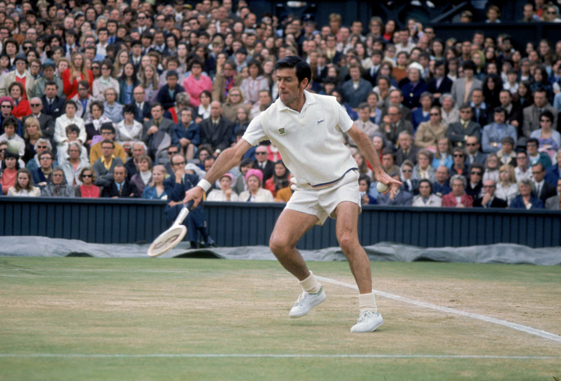 Legendary Tennis Athlete, Ken Rosewall in Action Wallpaper