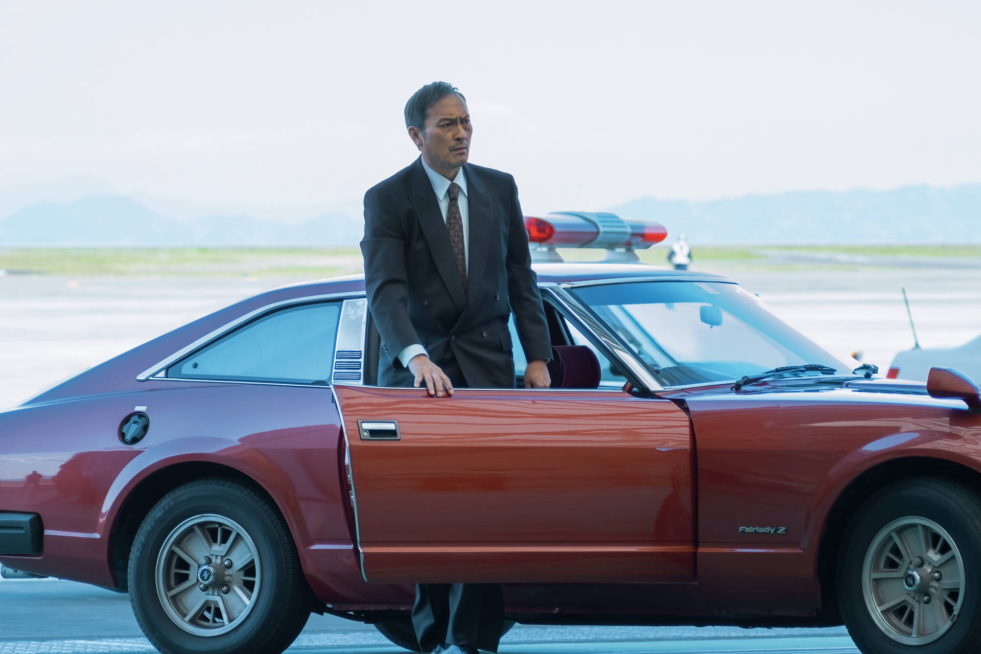 Ken Watanabe with Nissan Fairlady Z from Tokyo Vice Wallpaper