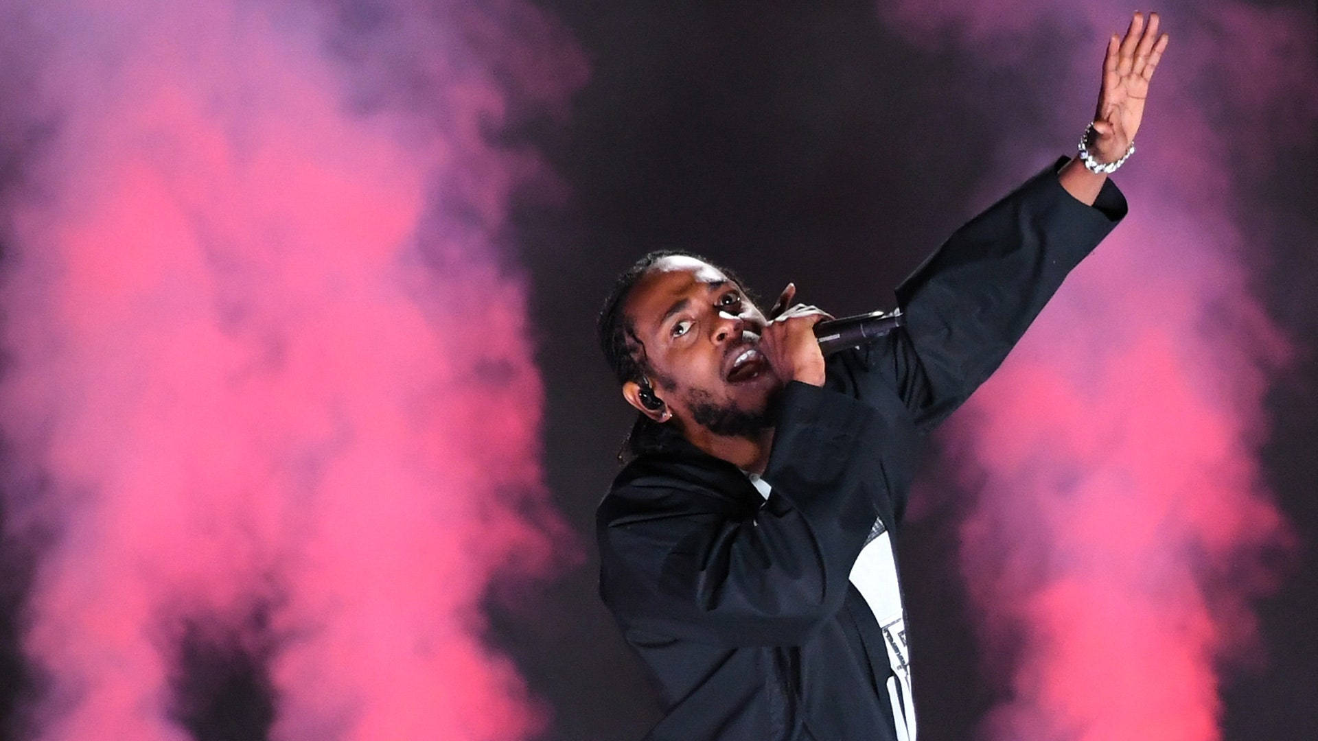 Kendrick Lamar Against Pink Smoke Background