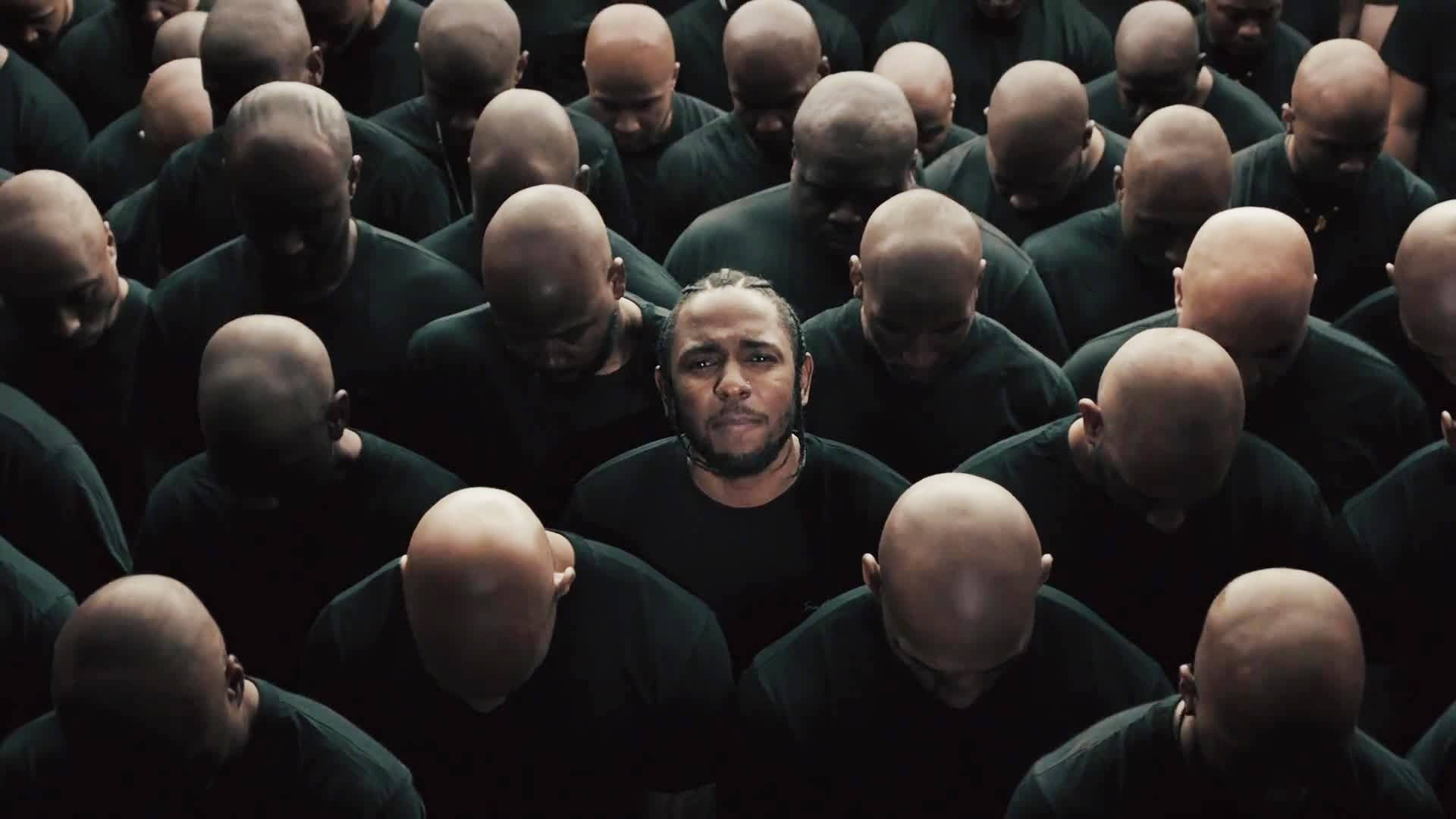 Kendrick Lamar With Bald Men Background