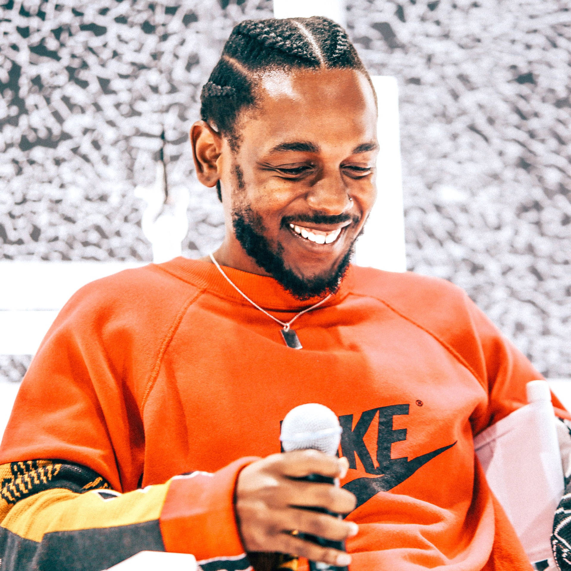 Kendrick Lamar With Mic Focus Photography Wallpaper