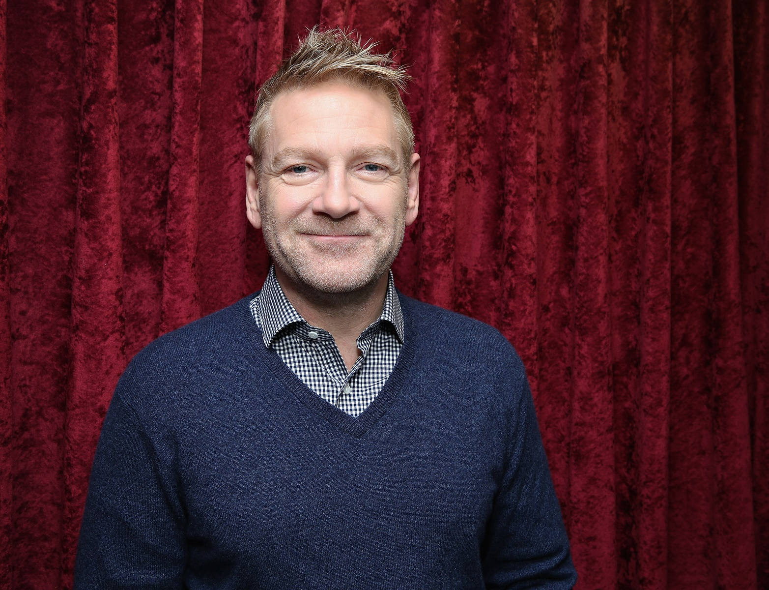Kenneth Branagh In Red Backdrop Wallpaper