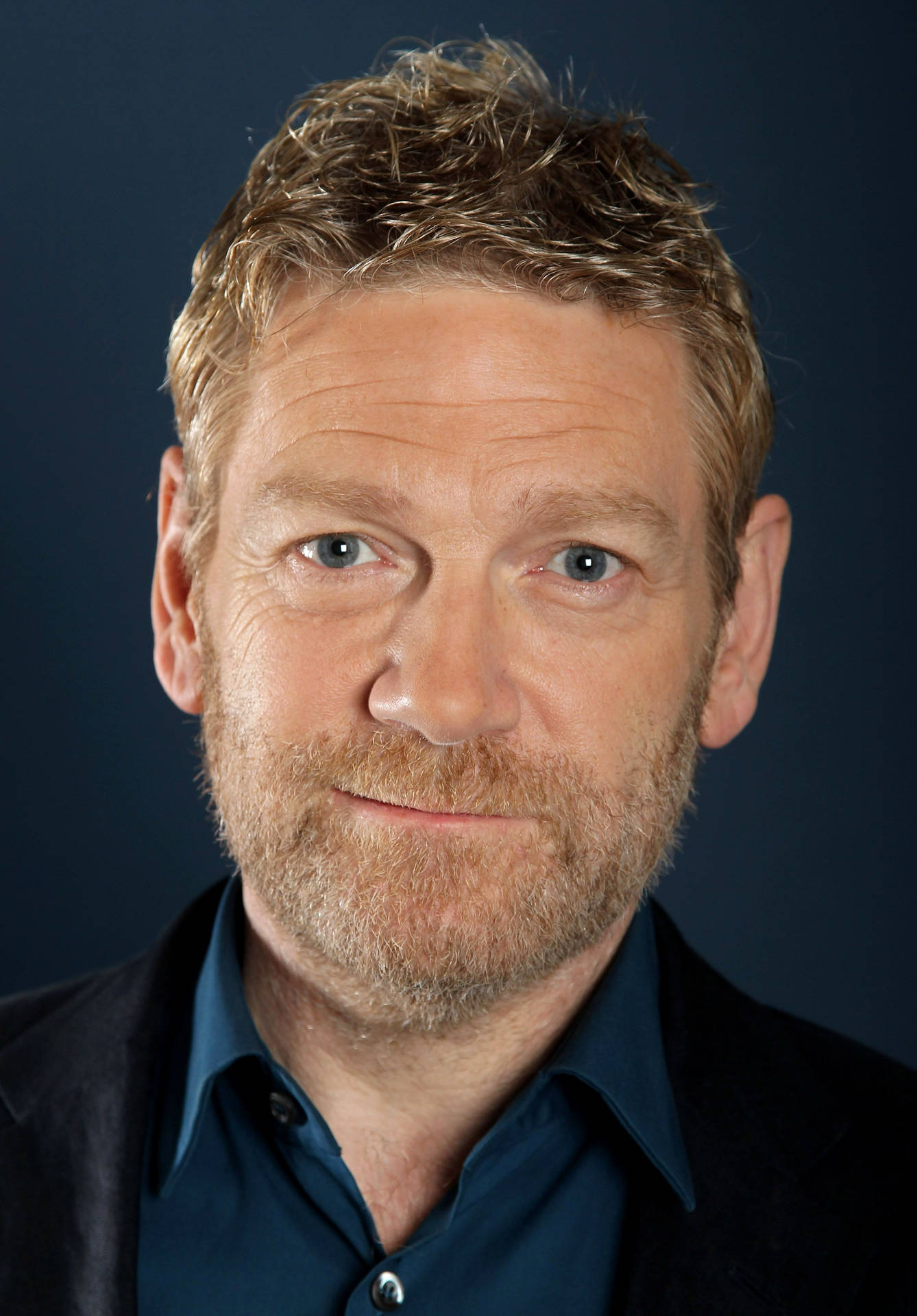 Acclaimed actor and director, Kenneth Branagh, in deep thought Wallpaper