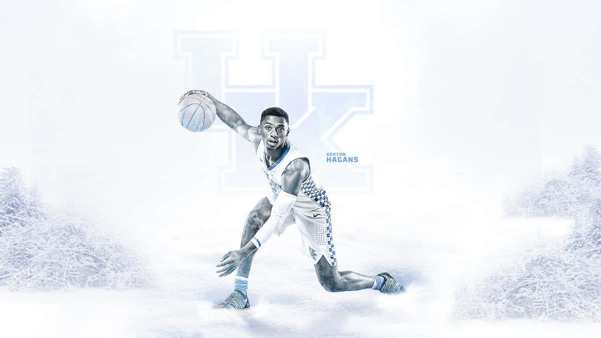 En Kentucky Wildcats basketball-spiller i sneen Wallpaper