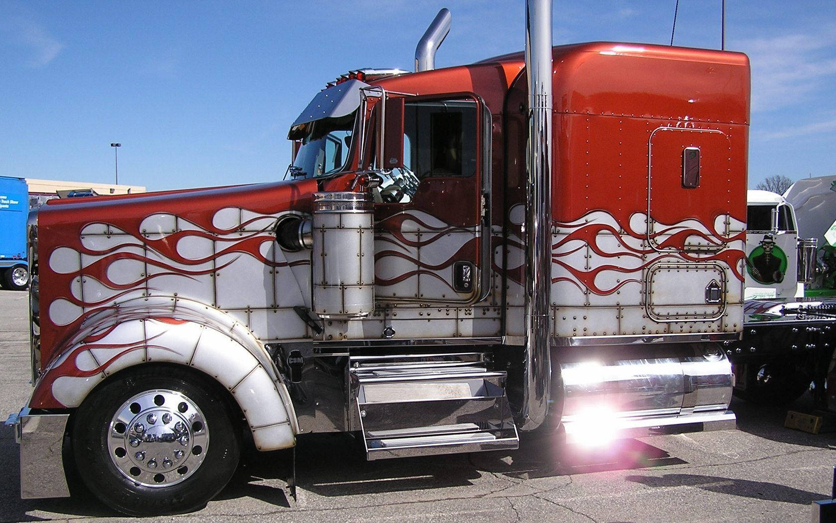 Caption: Bold Red Kenworth Truck in its Flame Design Wallpaper