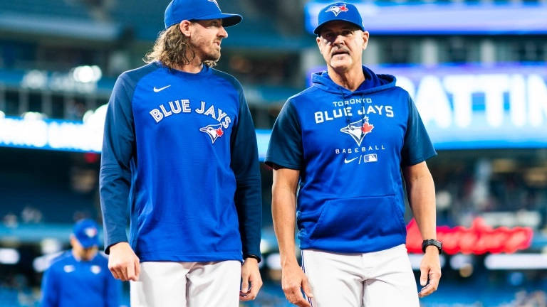 Download Kevin Gausman Toronto Blue Jays And His Coach Wallpaper