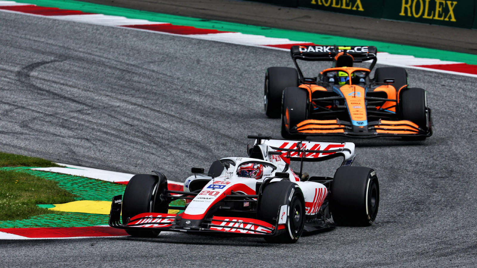 Kevin Magnussen in Intense Race with McLaren Wallpaper