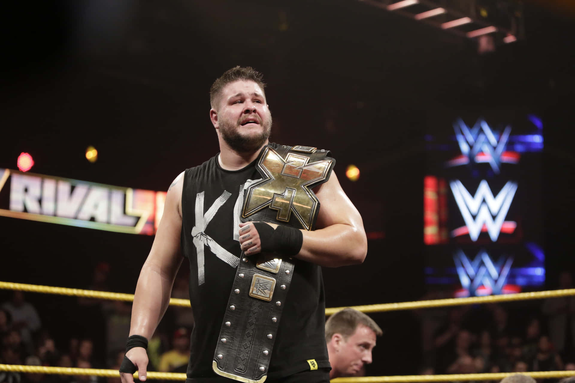 Wrestler Kevin Owens Hold the WWE NXT Title Wallpaper