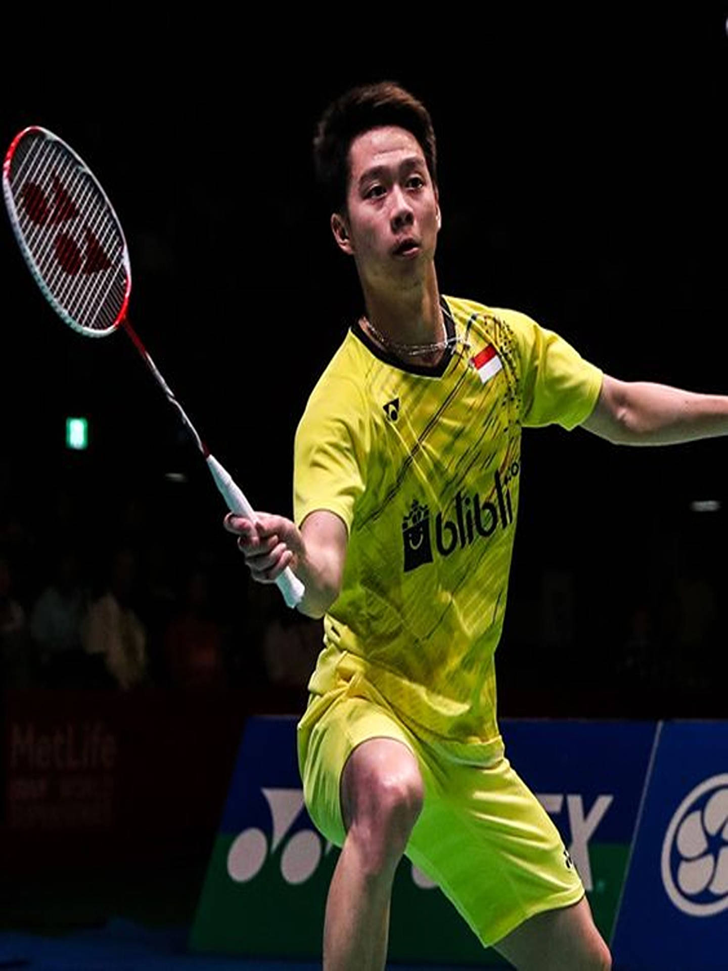 Kevin Sanjaya, The Badminton Maestro In Action Wallpaper