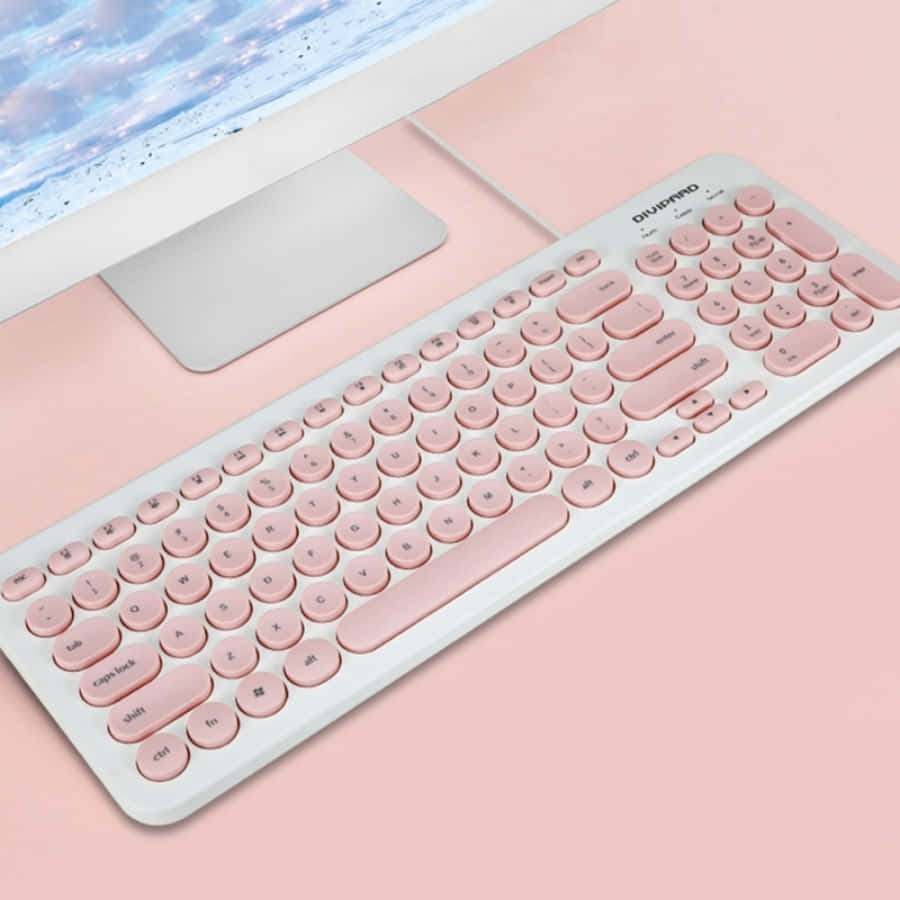 Einepinkfarbene Tastatur Auf Einer Pinkfarbenen Oberfläche