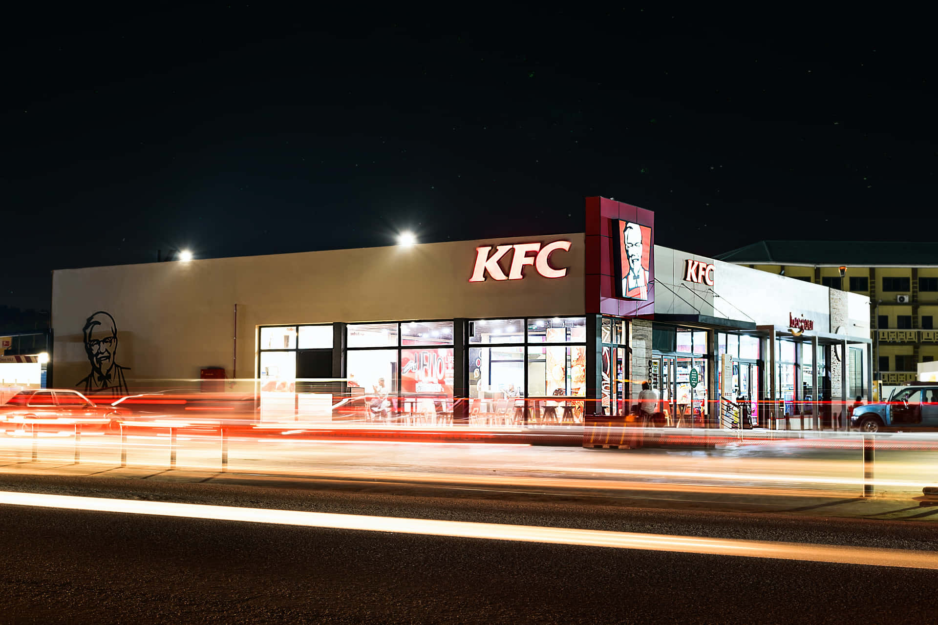 A Kfc Restaurant At Night